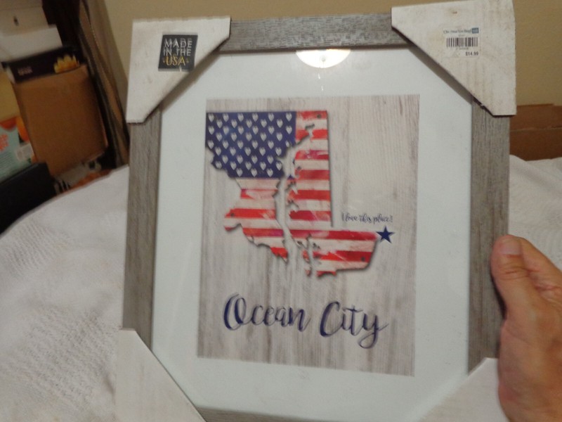 ocean city Maryland in picture in frame with glass and card board corner covers