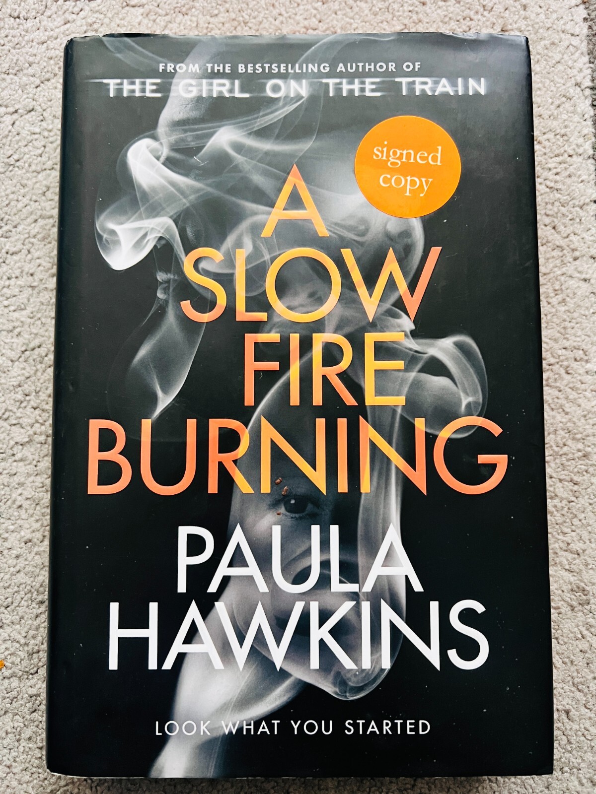 A SLOW FIRE BURNING by PAULA HAWKINS - signed by the author (SB3034)