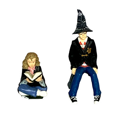 Harry Potter w/ wizard hat & Hermione Granger seated reading spells~figures RARE