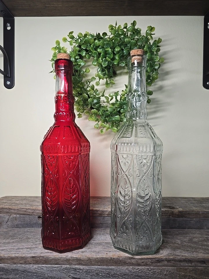 2 DE BOTELLAS DECORATIVAS DE VIDRIO ROJO Y TRANSPARENTE 12" DE ALTO Foto 4 de 4