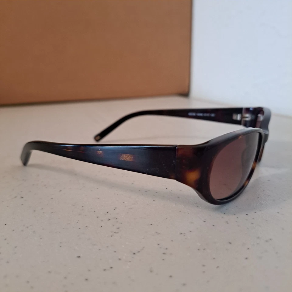 Óculos de sol Anne Klein infantil/adolescente AK5129 armação oval preta lente roxa P-58 - Imagem 4 de 4