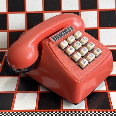 Vintage rotes Drucktelefon Kunststoff Spardose mit Wunder für klingelnde Tasten