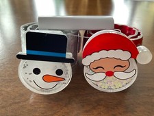 Claire  s Santa/Snowman Snap Bracelets
