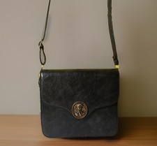 Vintage Black Shoulder Bag with Gold Bear Medallion, Elegant Accessory