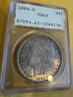1884-O Morgan Silver Dollar. PCGS Rattler OG Gen 1.2 Holder. MS63 PCGS  Toned