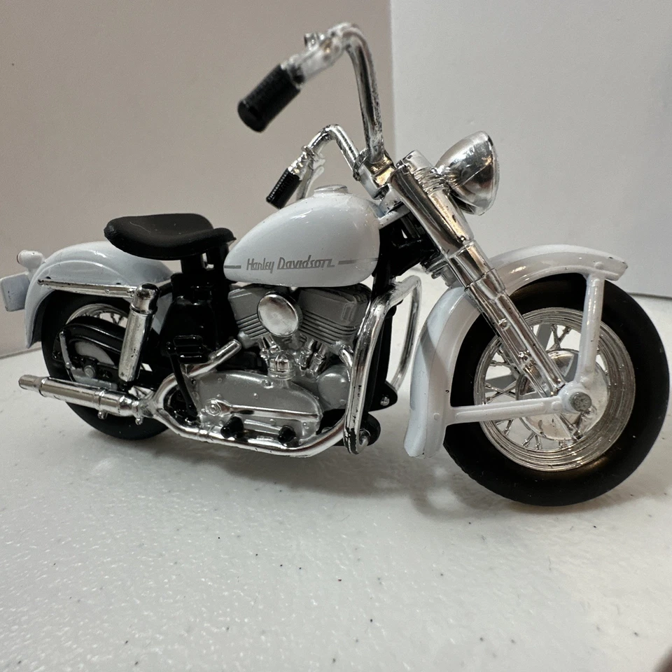 Harley Davidson Maisto modelo K 1952 blanca (37) escala 1:18 Foto 3 de 4