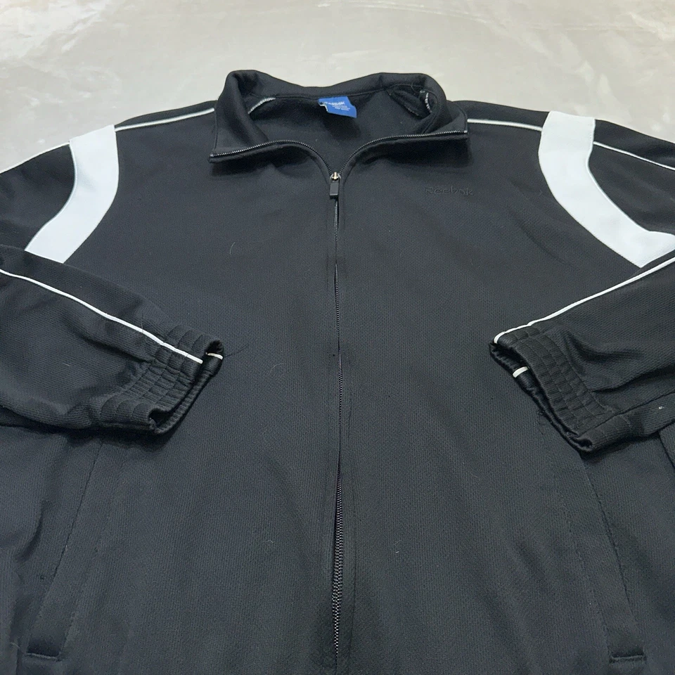 Женская спортивная куртка Reebok Размер L Цвет черный Карманы на молнии - Изображение 2 из 4