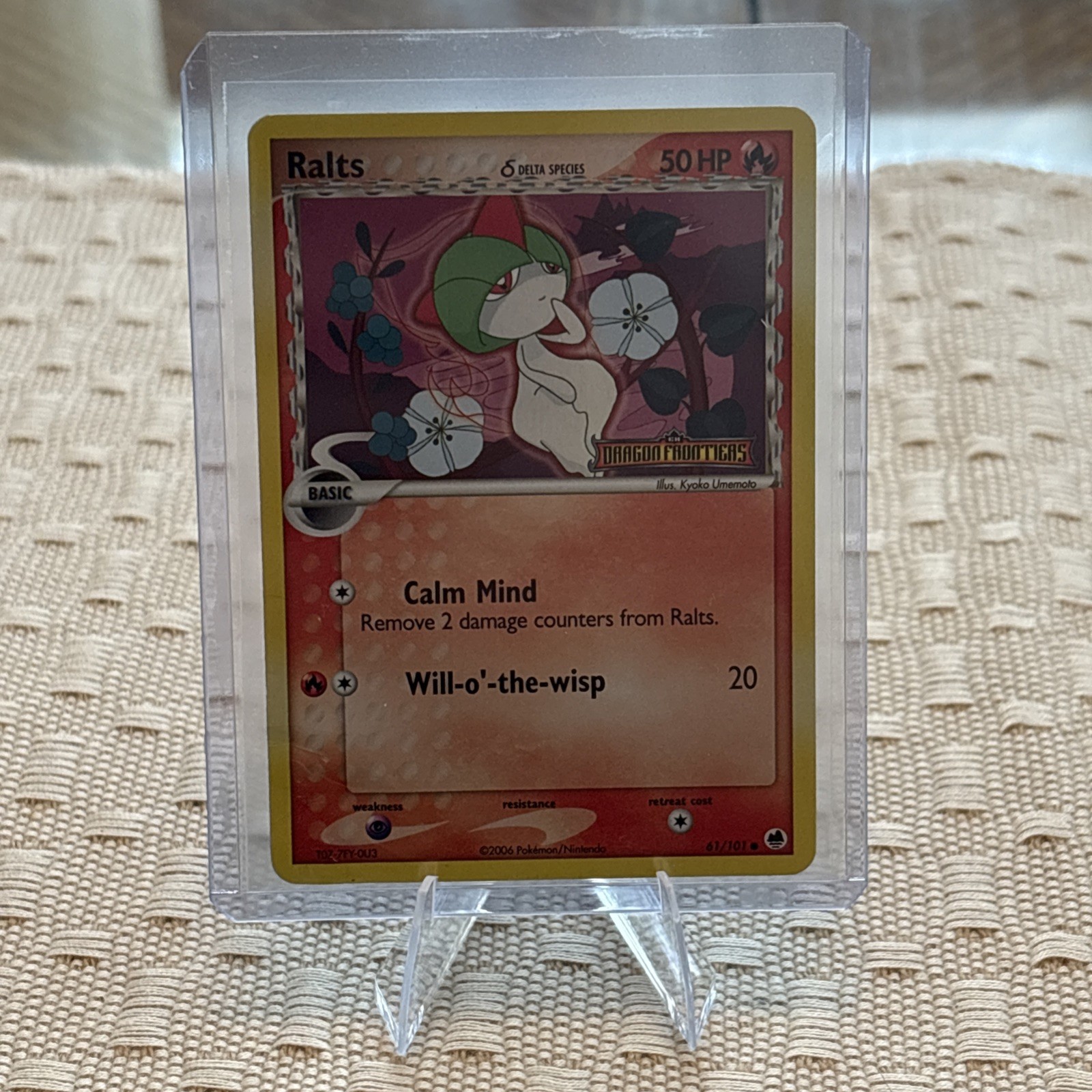 Ralts (Delta Species) 61/101 STAMPED Pokemon Dragon Frontiers Reverse Holo - LP