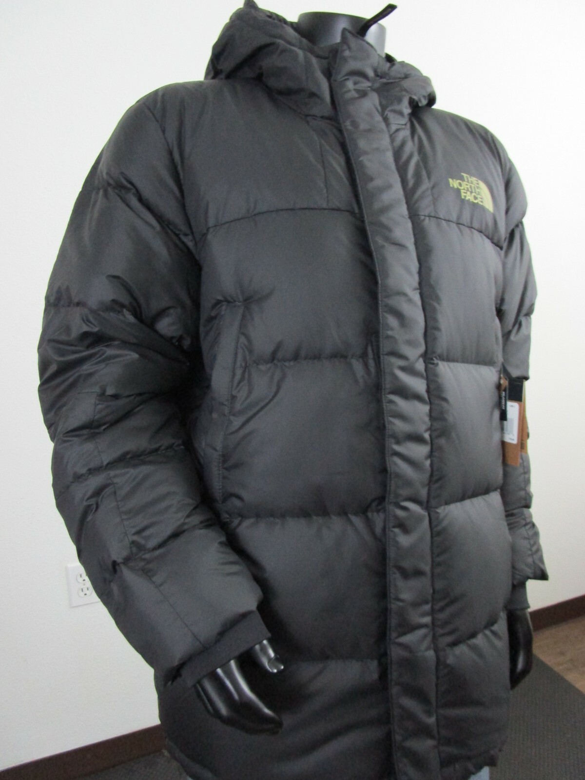 north face black and gold jacket