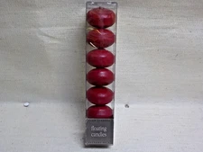 Never Opened Package of 7 Denmark Red Floating Candles