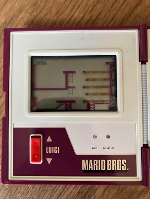 Nintendo Mario Bros. Game and Watch MW-56 Multi Screen 1983 Used