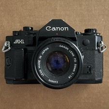 Canon A-1 Black 35mm SLR Film Camera Body with FD 50mm f1.8 Lens