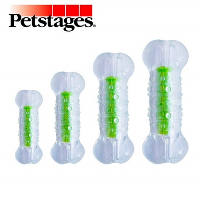 dog chewing on water bottle