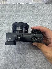 Sony Alpha A6000 Mirrorless Digital Camera w/16-50mm Lens English Language Black