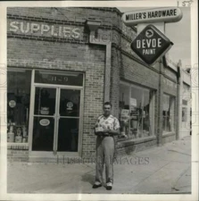 1956 Press Photo Earl F. Miller, owner of Gentilly Hardware store - nox59991
