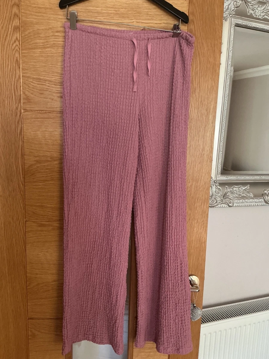 Pantalón elástico rosa H&M talla M