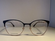 Fossil 7041 eyeglasses a stainless steel frame in a matte black N gold color