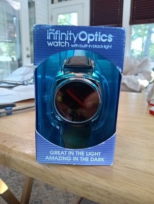 INFINITY OPTICS WATCH WITH BUILT IN BLACK LIGHT NEW IN BOX  New Dimension