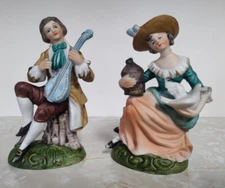 Norleans Man with Guitar and Lady with Bird Figurines Lot of 2
