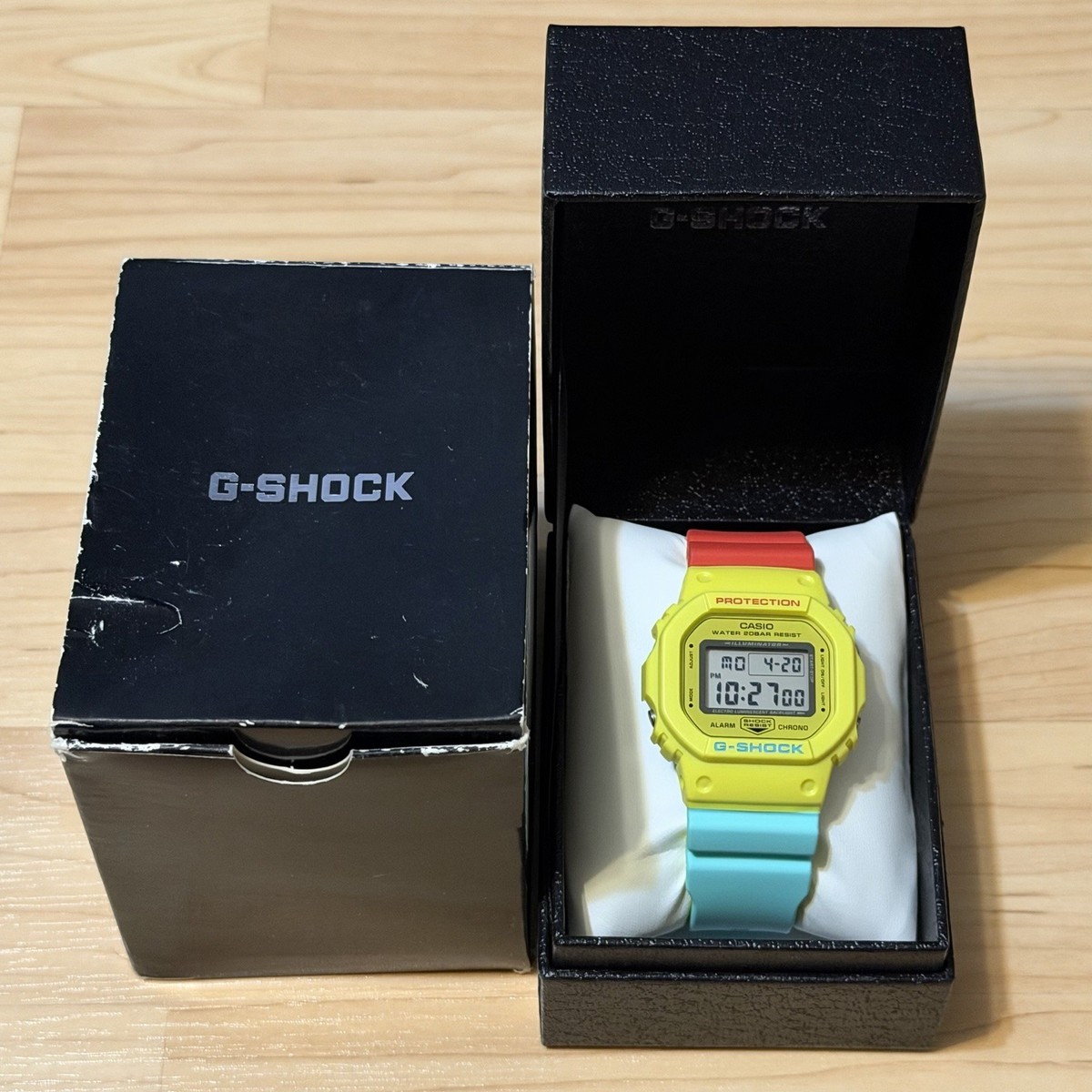 Casio G-Shock DW-5600CMA-9JF Breezy Rasta Square Digital Watch Casio G-Shock DW-5600CMA-9JF Breezy Rasta Square Digital Watch