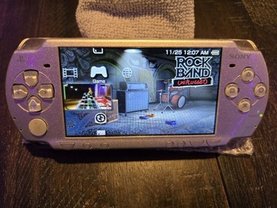 Sony PSP-2006 Handheld Game System Silver Battery Charger and 64gb SD Card Works