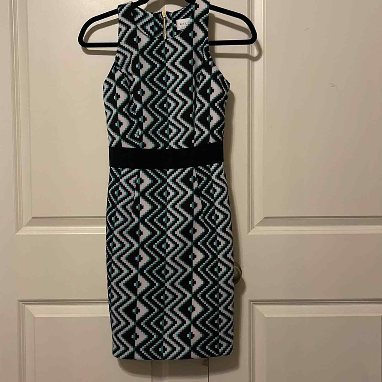 Milly sleeveless mini dress with green, black and white graphic print. Size 0.