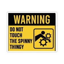 Funny Safety Warning Sticker. Don't touch the spinny thing. 