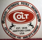 VINTAGE 1961 DATED COLT FIREARMS REVOLVERS PISTOLS GUNS 10” PORCELAIN GAS SIGN