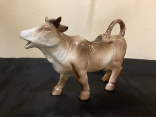 PORCELAIN COW SHAPED CREAMER 8 IN LONG