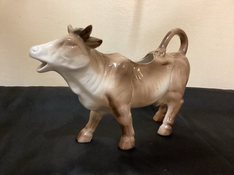 PORCELAIN COW SHAPED CREAMER 8 IN LONG