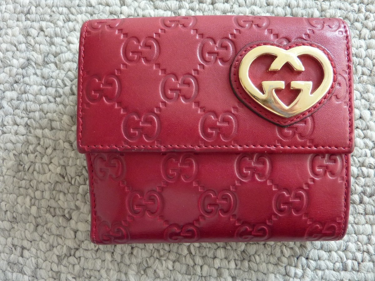 $525 GUCCI Red leather French flap Wallet Hearts detail $525 GUCCI Red leather French flap Wallet Hearts detail