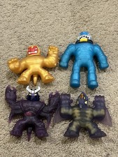 Lot of 4 Different Heroes of Goo Jit Zu Squishy Action Figures