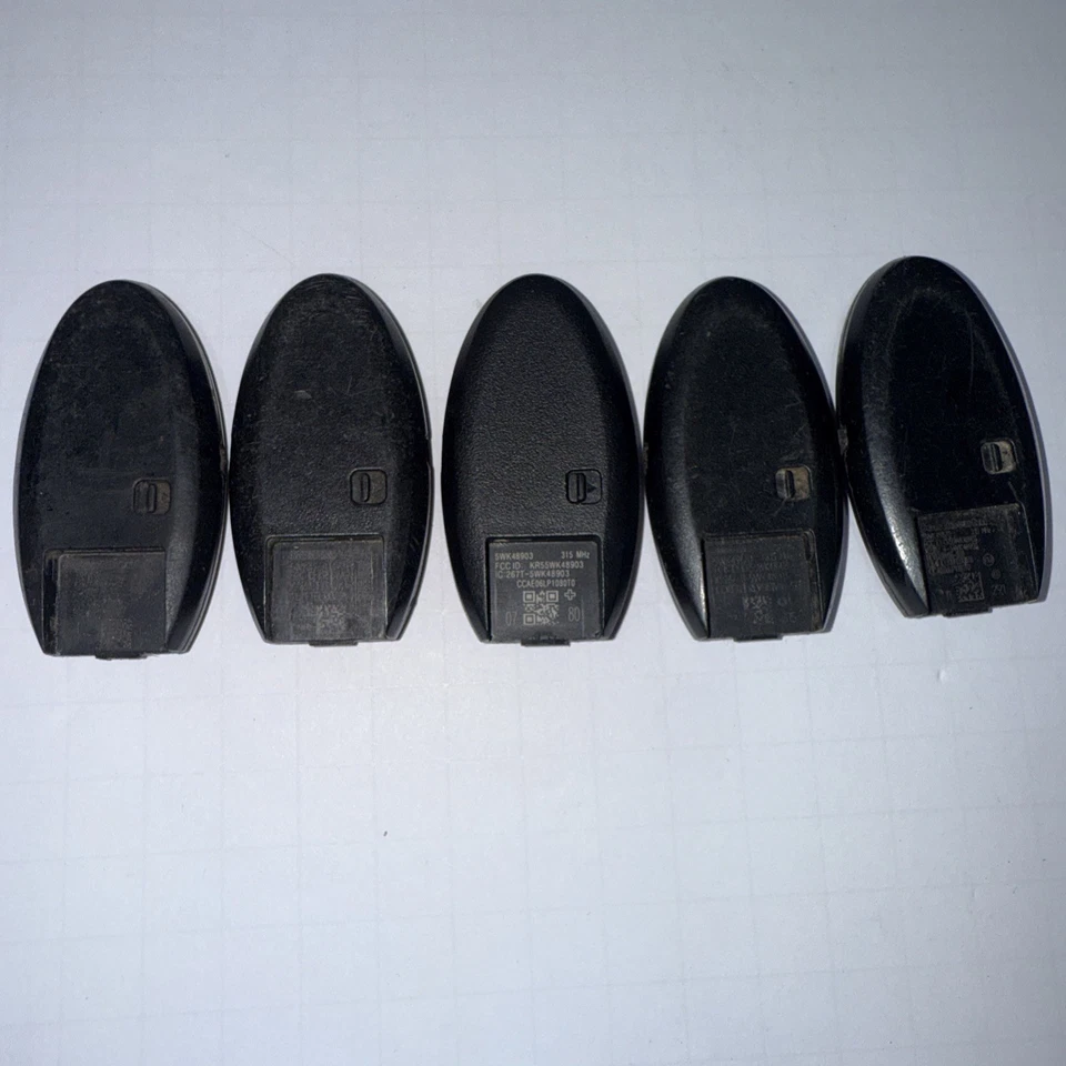 ORIGINAL LOT OF 5 NISSAN OEM SMART KEY LESS ENTRY REMOTE ID: KR5SWK48903 - Image 4 of 4