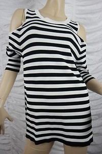 black shoulderless long sleeve top