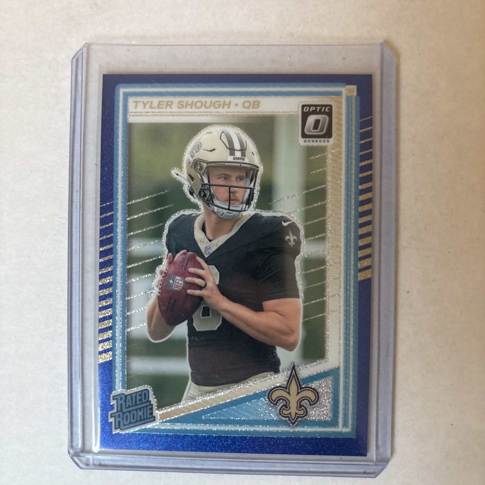 2025 Panini Donruss Optic - Rated Rookie Tyler Shough #223 Blue Glitter Prizm