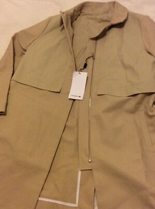 beige lacoste jacket