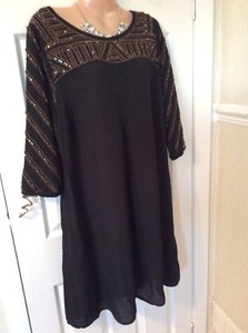 black and gold tunic top