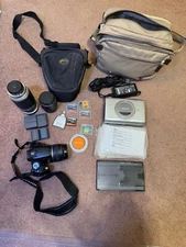 Canon EOS Rebel T2i 18 MP Digital SLR Camera - Black with many accessories