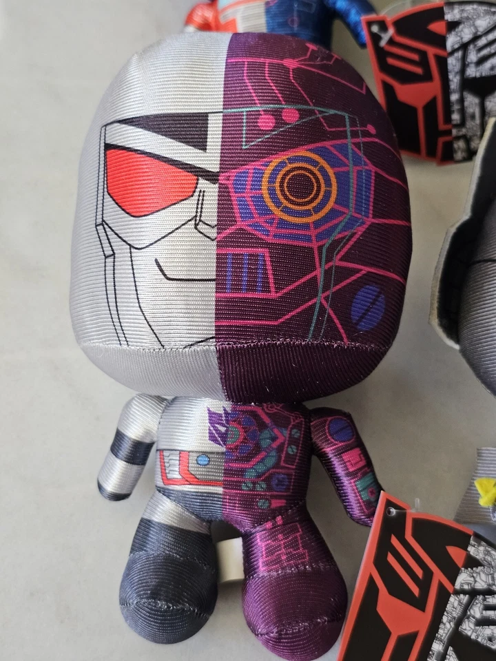 Transformers More Than Meets The Eye Juego de 4 Peluches Metálicos Edición Limitada NUEVO Foto 4 de 4