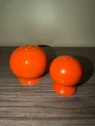 Pair of Vintage Fiestaware Orange Salt & Pepper Shakers "Atomic Era"