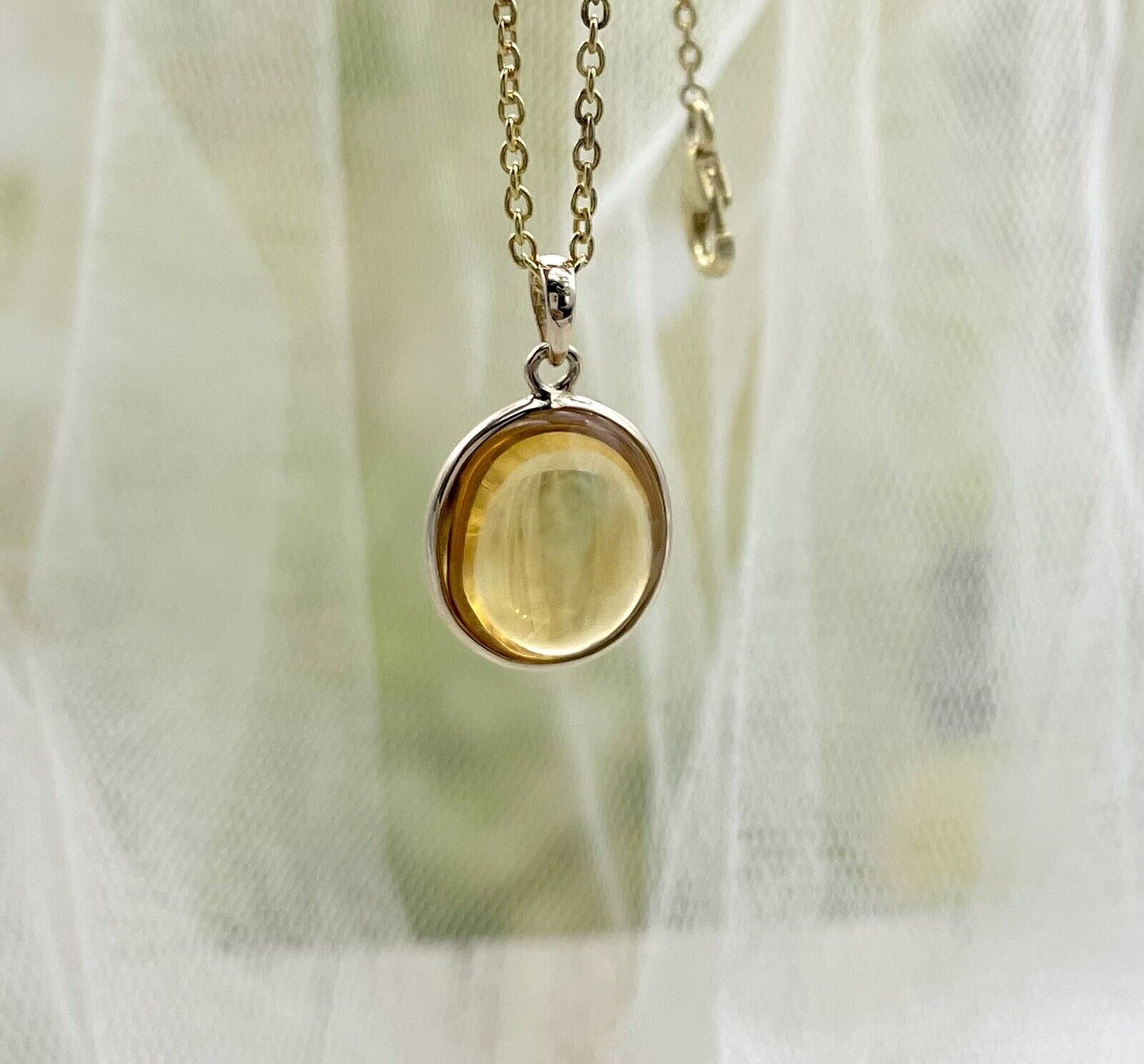 Pendule égyptien œil de tigre lumineux - Christelle Vinals