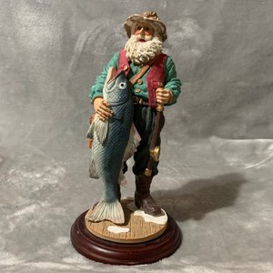 ceramic santa with fish and fishing pole Fishing Santas