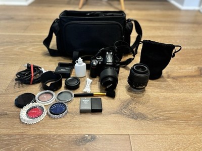 Nikon D3000 Camera With 55-200mm And 18-55mm Lens With Batteries, Case, Etc.