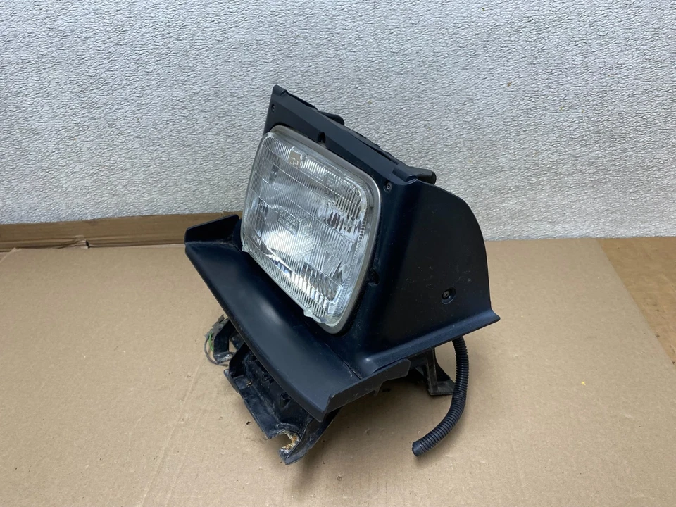 Pontiac Fiero 1985 1986 conductor izquierdo lado izquierdo faro halógeno OEM U0919 DW Foto 2 de 4