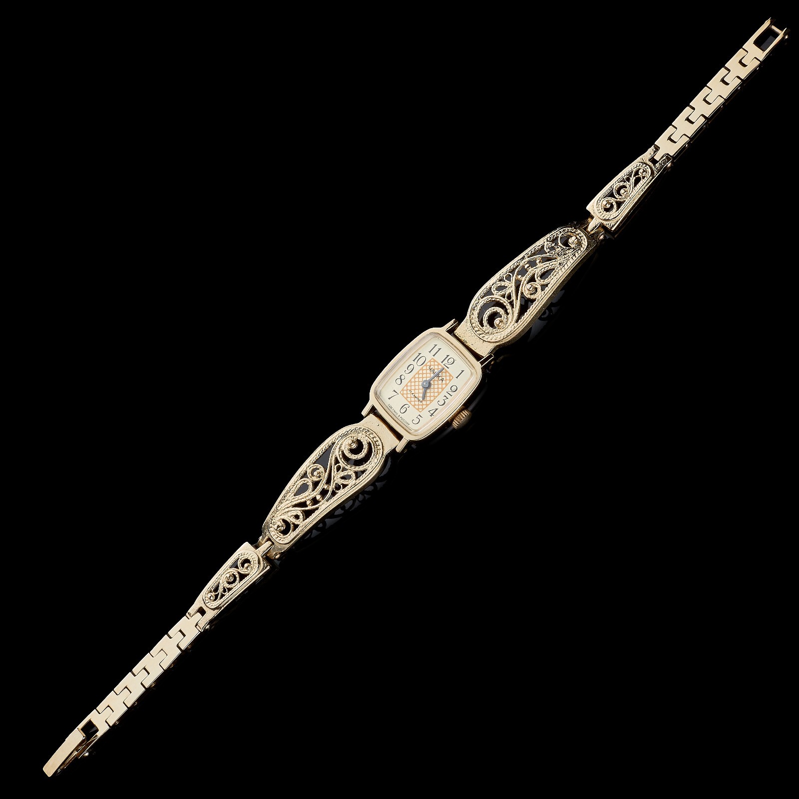 Small women's cocktail watch with gold color. Vintage women's mechanical watch.