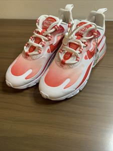 nike branco com simbolo vermelho