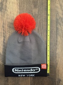 Nintendo New York Beanie Hat &ndash; Gray & Black with Red Pom &ndash; Retro NES Controller