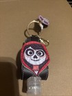 DISNEY PARKS PIXAR COCO MIGUEL DIA DE LOS MUERTOS 1 OZ SANITIZER HOLDER KEYCHAIN — photo 1