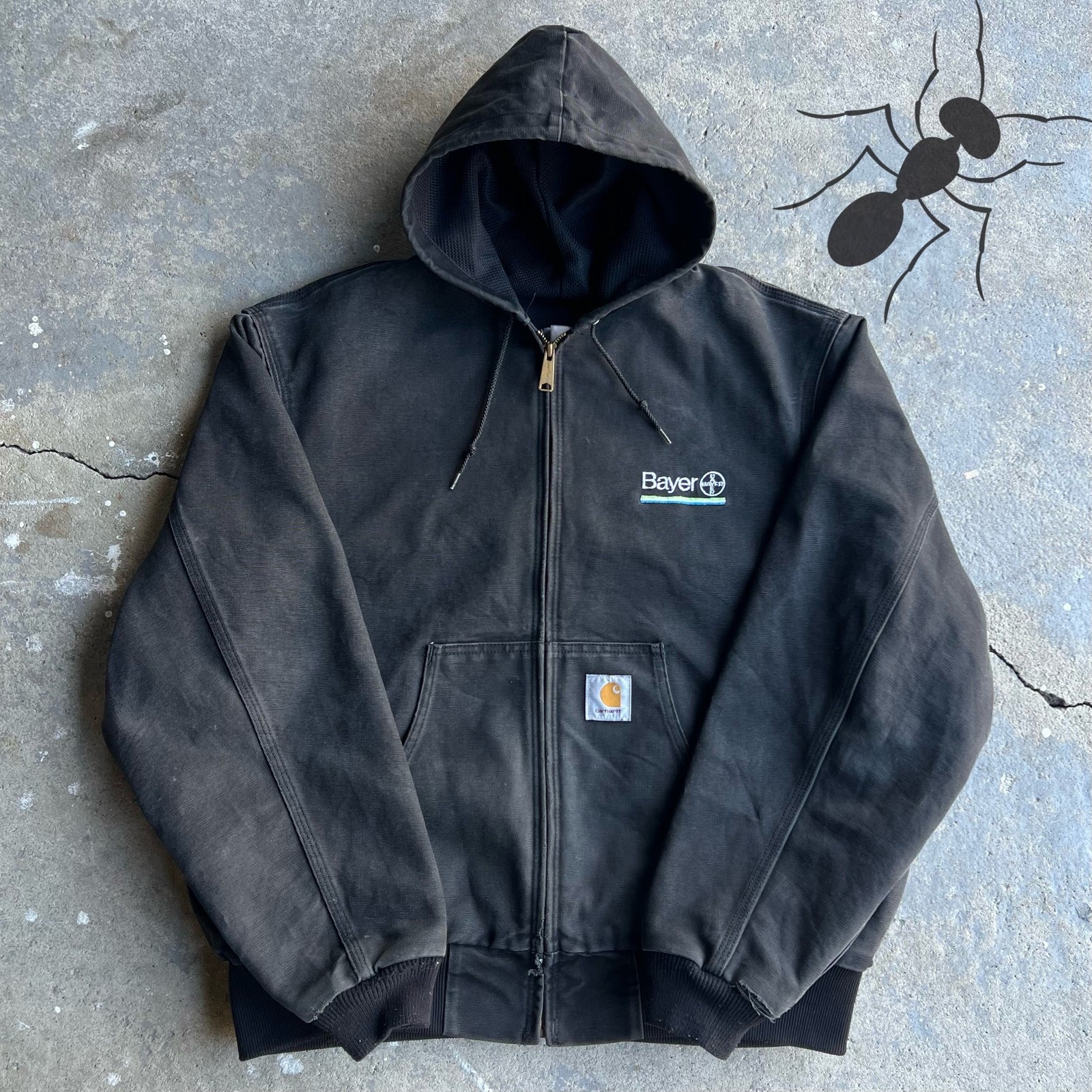 Vintage Y2K black Carhartt hooded work jacket for active wear