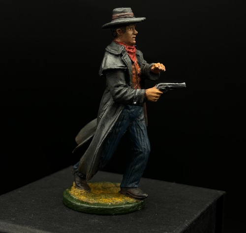 Vaquero de hojalata coleccionable con impermeable - Imagen 4 de 4